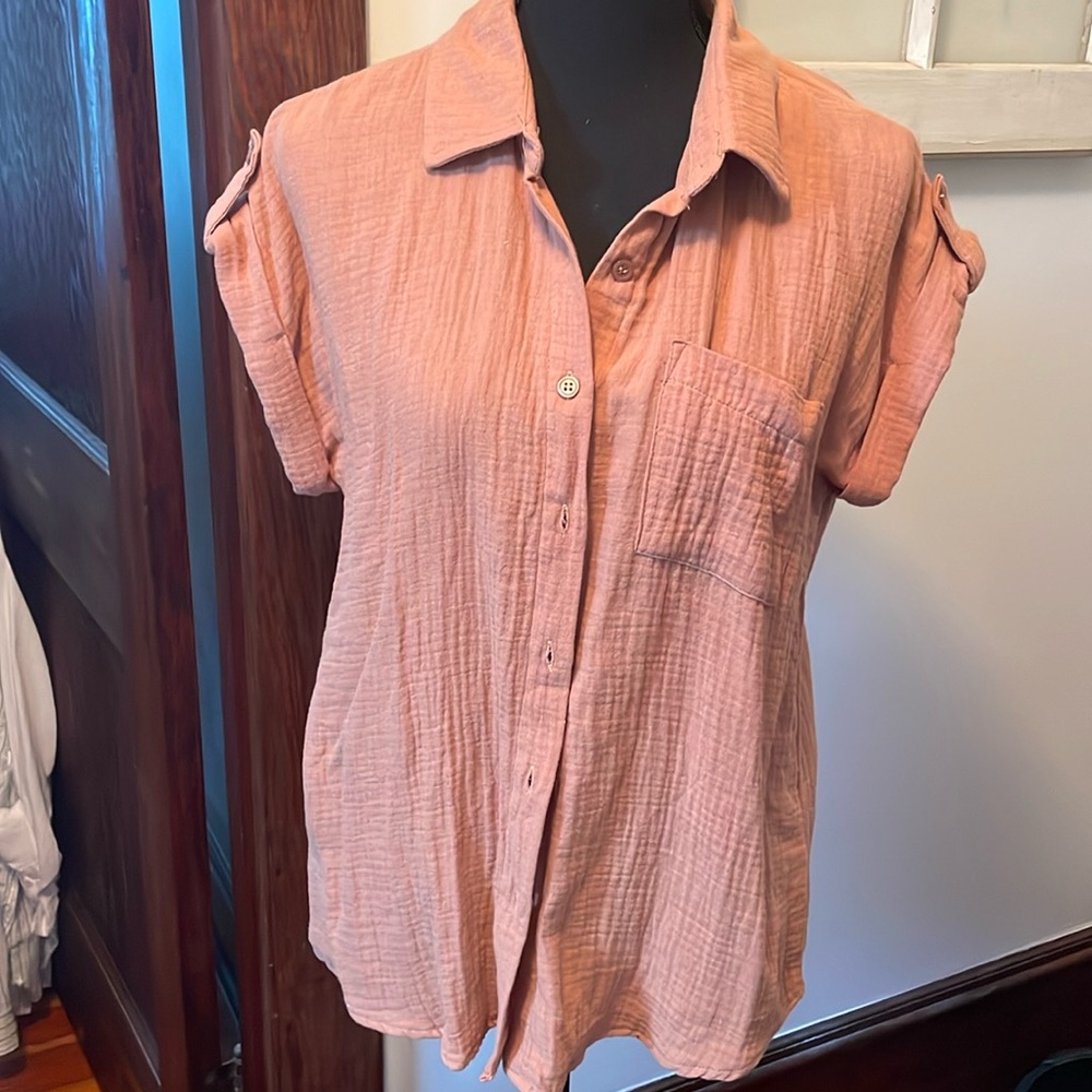 Women’s size medium, button down shirt.